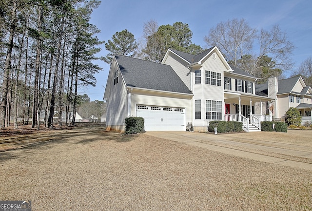 view of front of property with a porch, roof with shingles, driveway, and a garage