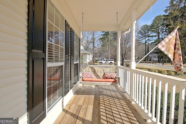 wooden terrace with covered porch