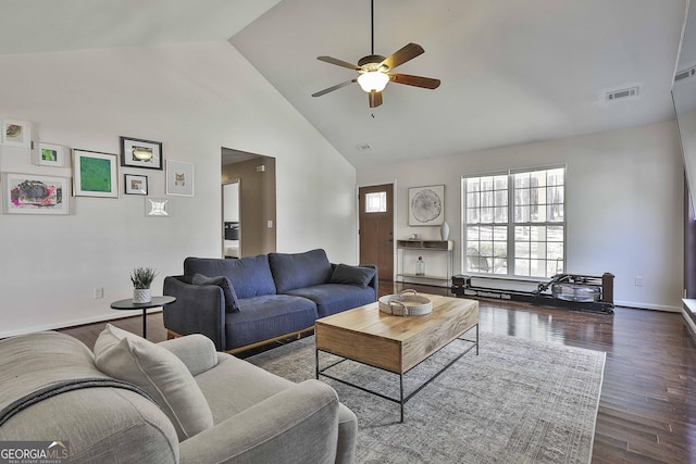 living room with baseboards, visible vents, high vaulted ceiling, dark wood finished floors, and ceiling fan