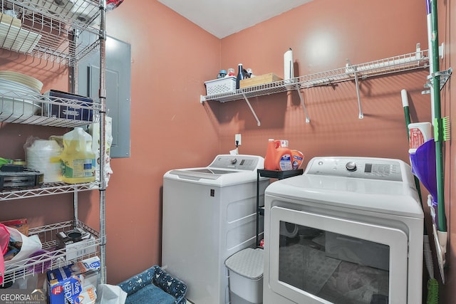 laundry room featuring washing machine and dryer and laundry area