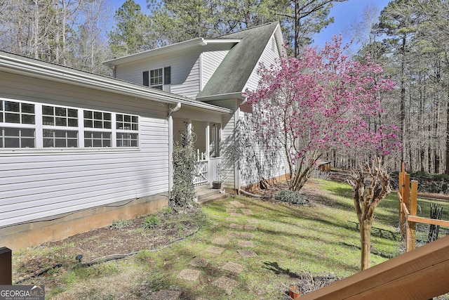 view of home's exterior featuring a lawn