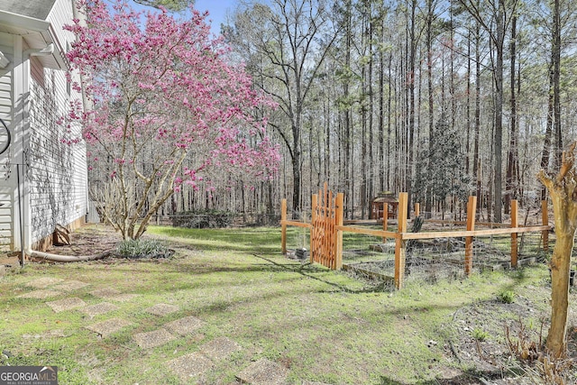 view of yard with fence