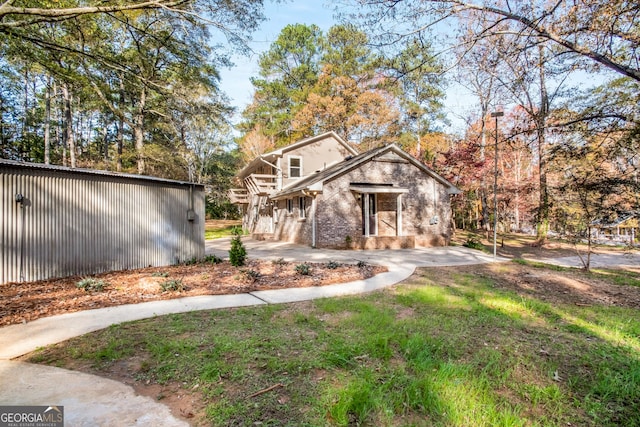 view of front of house featuring brick siding