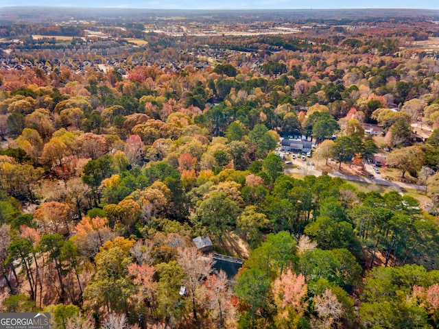 aerial view with a wooded view