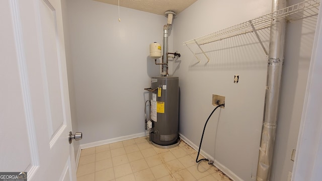 utility room featuring water heater