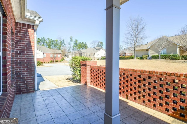 view of patio / terrace with a residential view