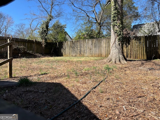 view of yard featuring a fenced backyard