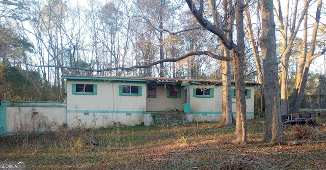 view of side of property featuring crawl space