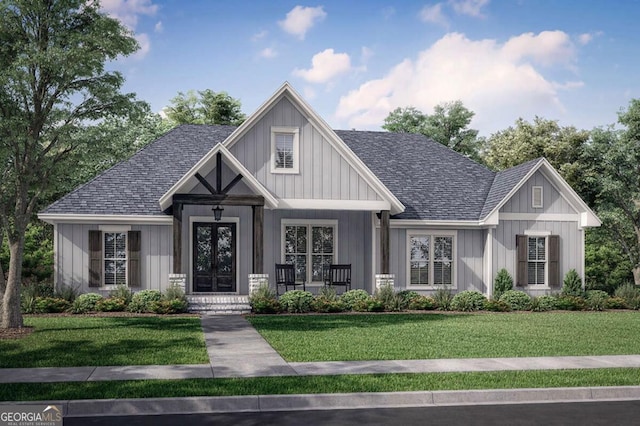 view of front facade with roof with shingles, a front lawn, and board and batten siding