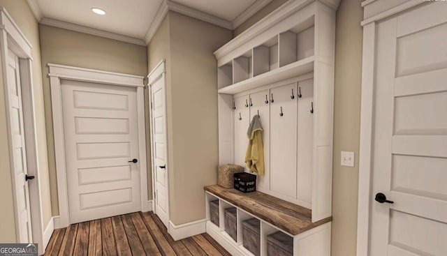 mudroom with ornamental molding, dark wood-style flooring, recessed lighting, and baseboards