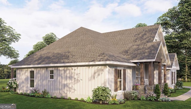 view of home's exterior with a shingled roof, a lawn, and board and batten siding