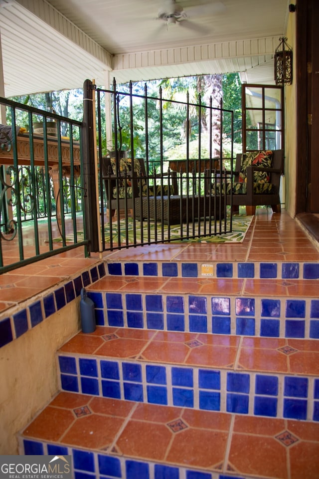 view of patio featuring a ceiling fan