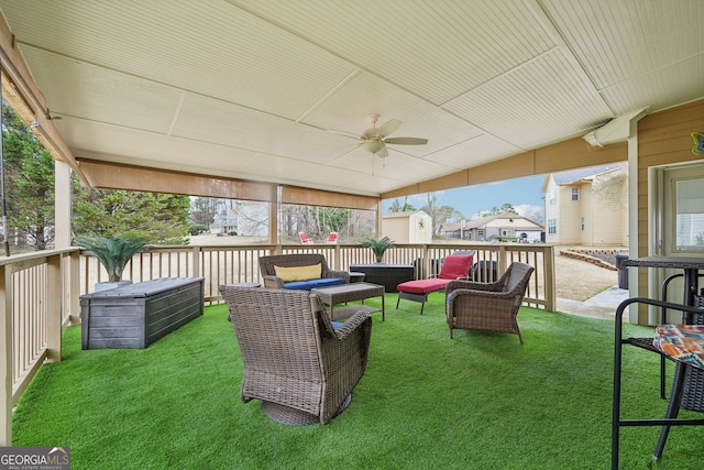 exterior space with ceiling fan, outdoor lounge area, and a wooden deck