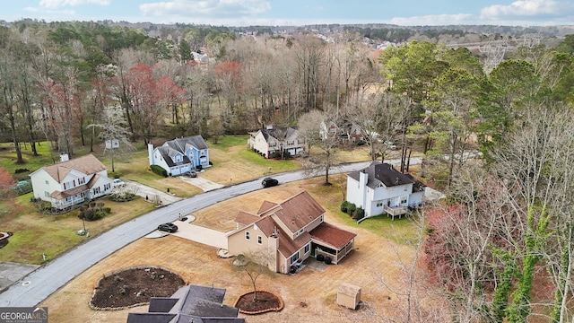 bird's eye view with a view of trees