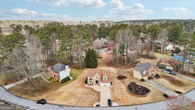 drone / aerial view with a view of trees