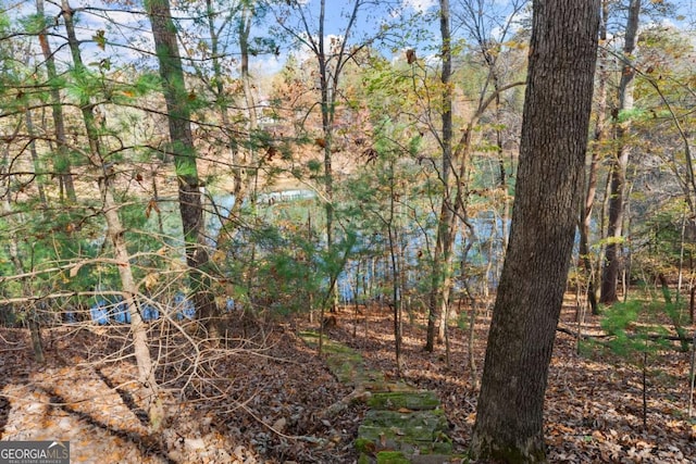 view of landscape with a view of trees