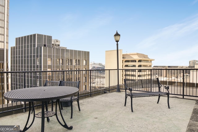 view of patio / terrace with a balcony