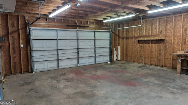 garage with wood walls