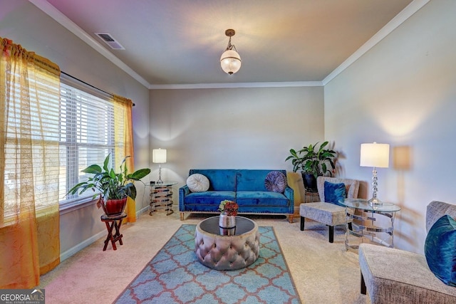 carpeted living area with baseboards, visible vents, and crown molding