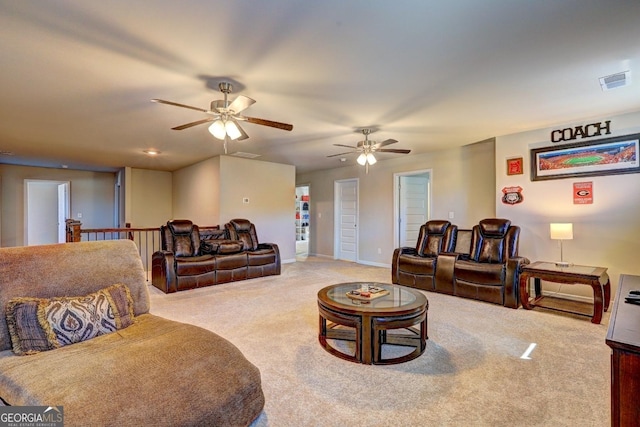 carpeted living area with visible vents and baseboards