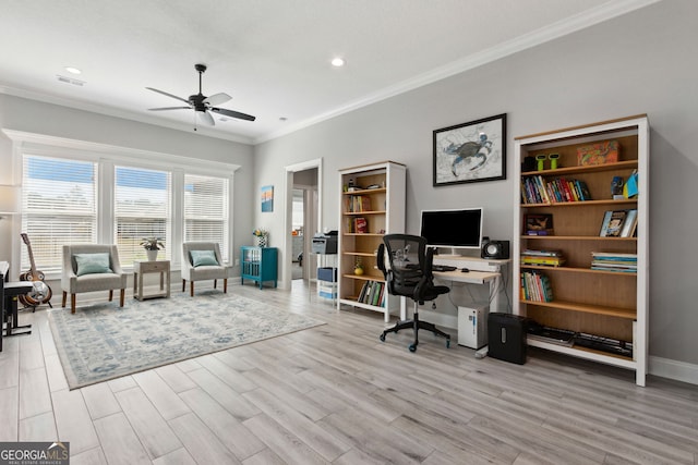 home office with baseboards, visible vents, ornamental molding, and wood finished floors