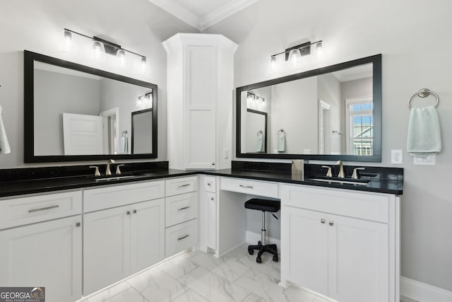 full bathroom with marble finish floor, vanity, and crown molding