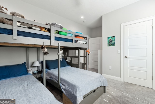 carpeted bedroom featuring recessed lighting and baseboards