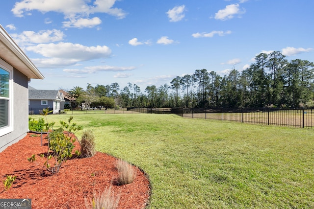 view of yard with fence