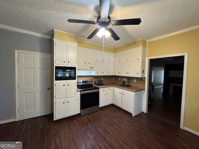 3 Elm St, Porterdale, GA 30014 - kitchen featuring stainless steel range with electric stovetop, black microwave, under cabinet range hood, dark wood finished floors, and white cabinetry