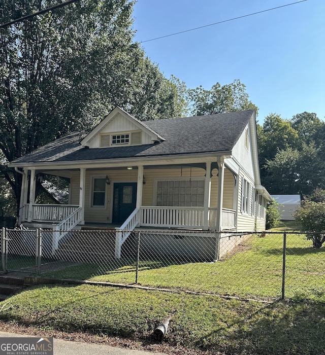 3 Elm St, Porterdale, GA 30014 - view of front of home with covered porch and a shingled roof