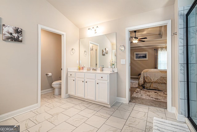 ensuite bathroom featuring ensuite bathroom, lofted ceiling, toilet, a ceiling fan, and marble finish floor