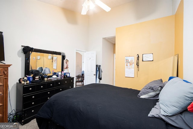 carpeted bedroom featuring a ceiling fan