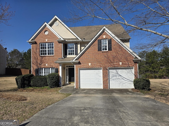 view of front of home featuring a garage, concrete driveway, and brick siding