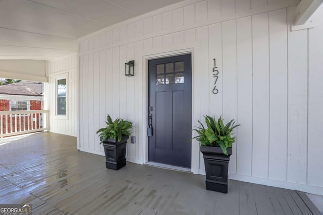 entrance to property with a porch