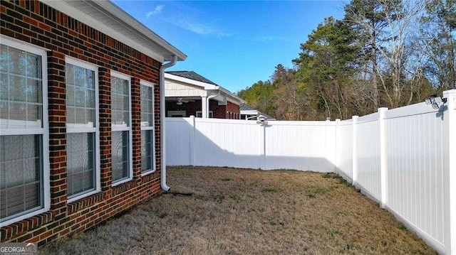 view of yard featuring a fenced backyard