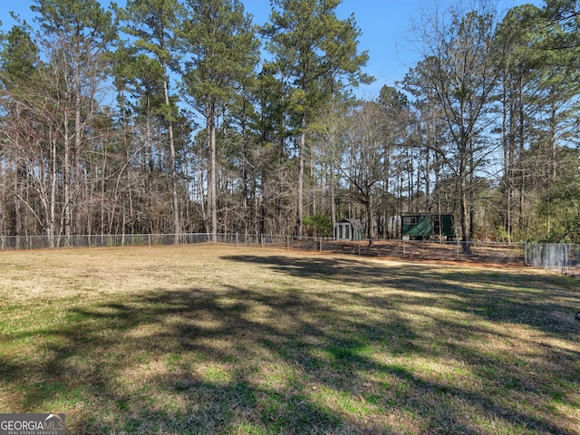 view of yard with fence