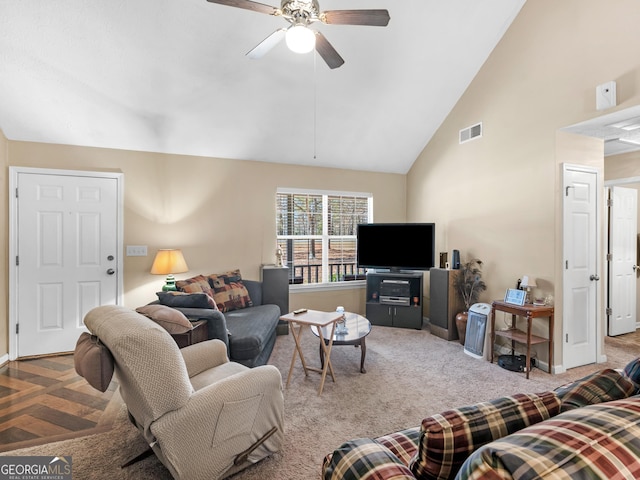 living room featuring a ceiling fan, carpet flooring, high vaulted ceiling, and visible vents