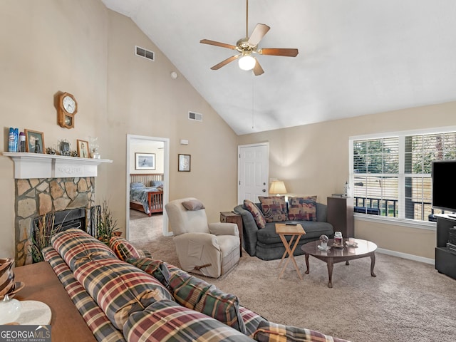 carpeted living room with visible vents, a fireplace, baseboards, and ceiling fan