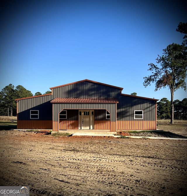 view of front of home with a porch and board and batten siding