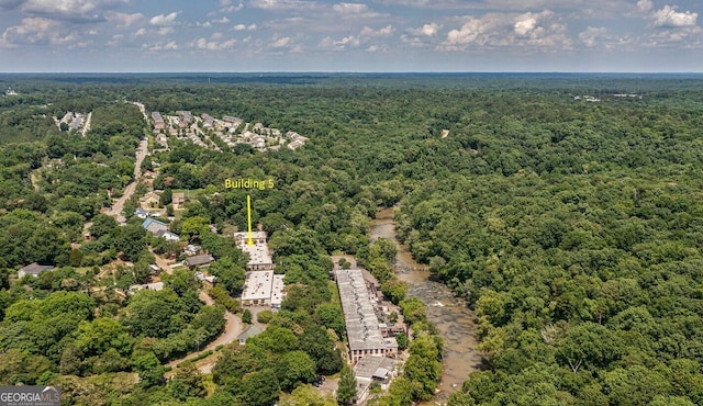 aerial view with a wooded view