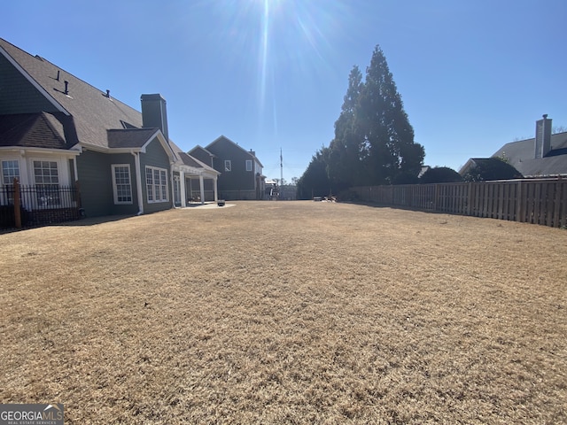 view of yard with fence