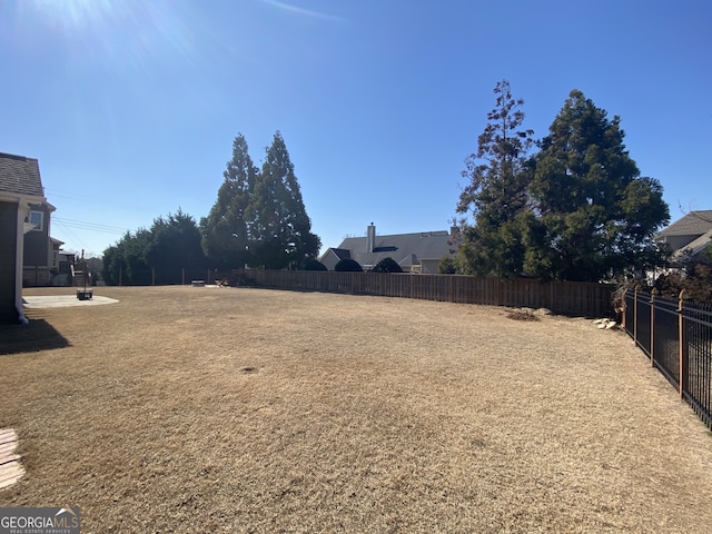 view of yard featuring fence