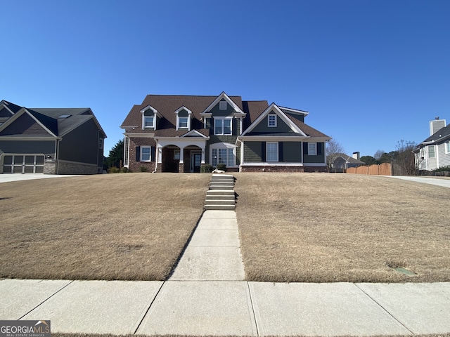 view of front of home with brick siding