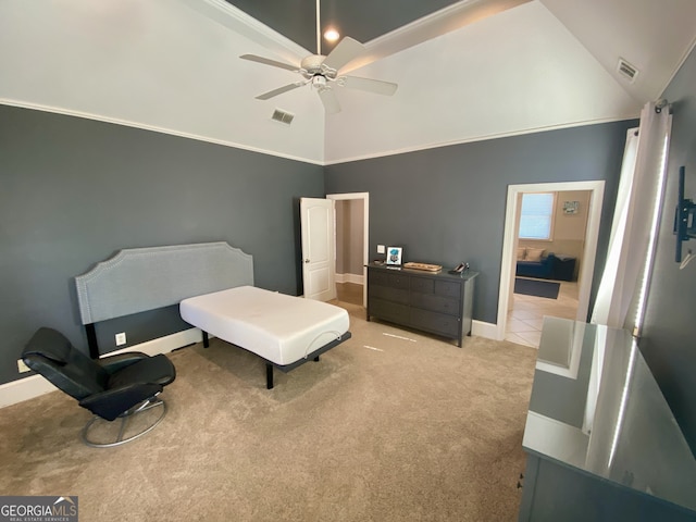 bedroom with a ceiling fan, light colored carpet, visible vents, and baseboards