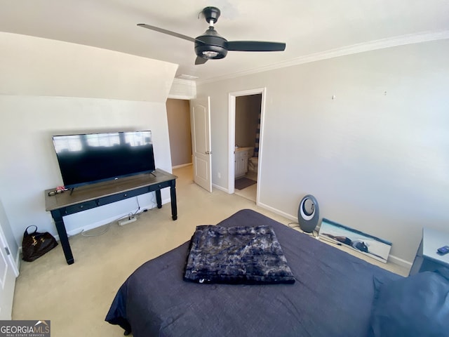 bedroom featuring crown molding, a ceiling fan, carpet flooring, connected bathroom, and baseboards