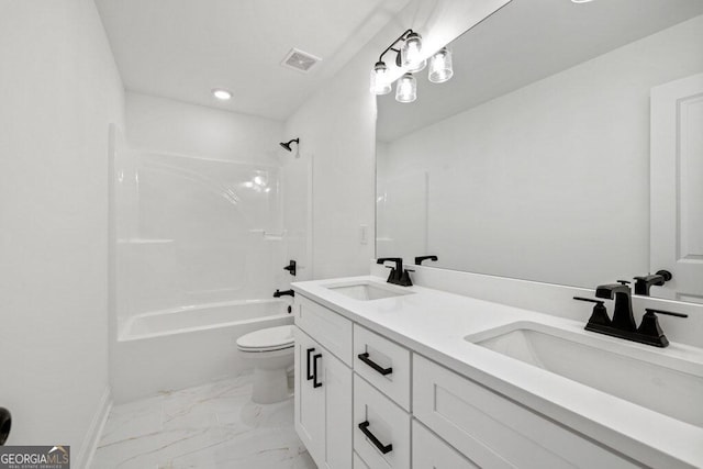 full bathroom with toilet, marble finish floor, visible vents, and a sink