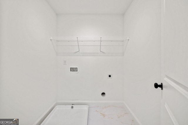 laundry room featuring marble finish floor, hookup for a washing machine, hookup for an electric dryer, laundry area, and baseboards