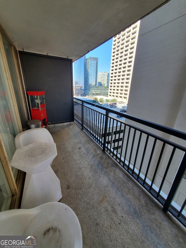 balcony featuring a city view