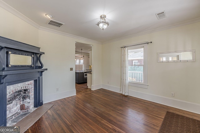 unfurnished living room with visible vents, ornamental molding, and dark wood finished floors