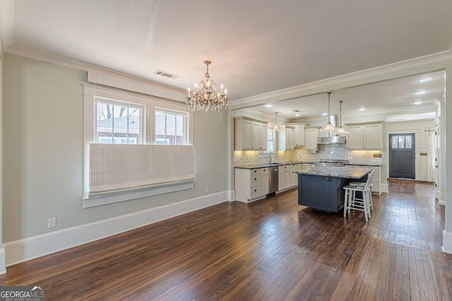 kitchen with crown molding, a kitchen breakfast bar, wall chimney exhaust hood, and dark wood-style floors